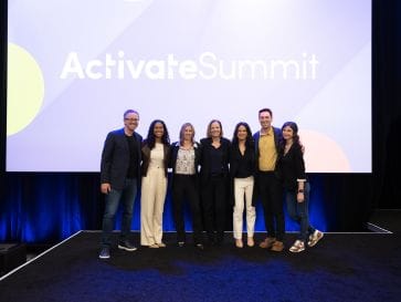 Iterable's leadership team on-stage at Activate Summit 2023 with the CMOs of Strava, Vimeo, and Gitlab.