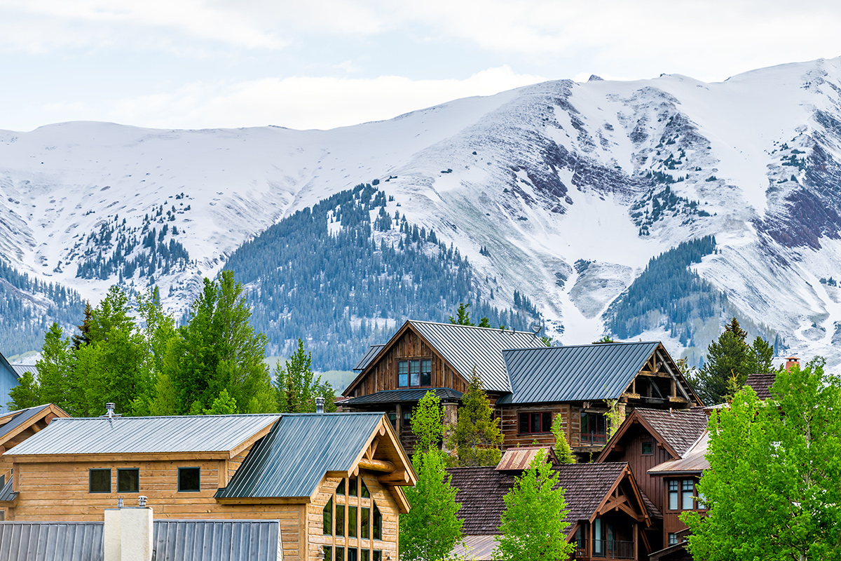 Colorado village in summer with hillside houses 