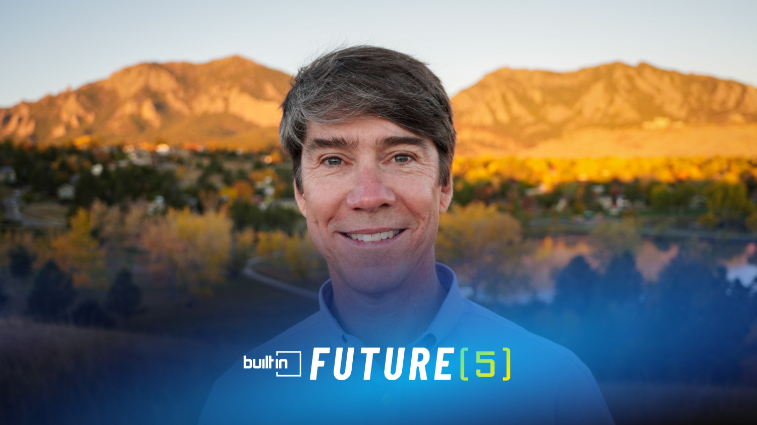 Frank Overton, founder and CEO of FasCat Coaching, stands in front of the Flatirons in Boulder.