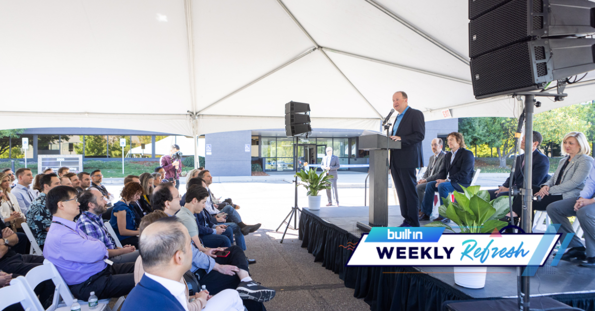 Gov. Jared Polis speaks at the opening of Atom Computing’s office in Boulder.