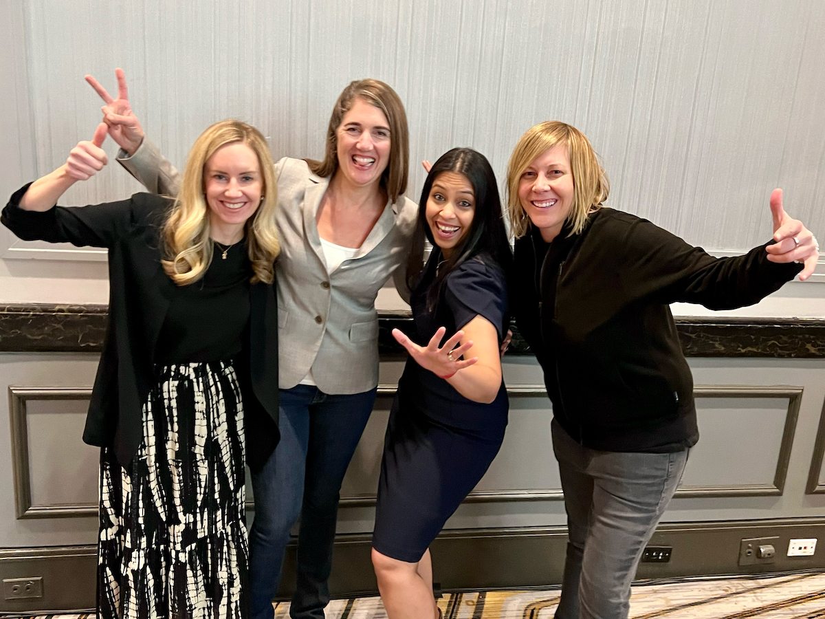 The women of Checkr's revenue leadership team pose together