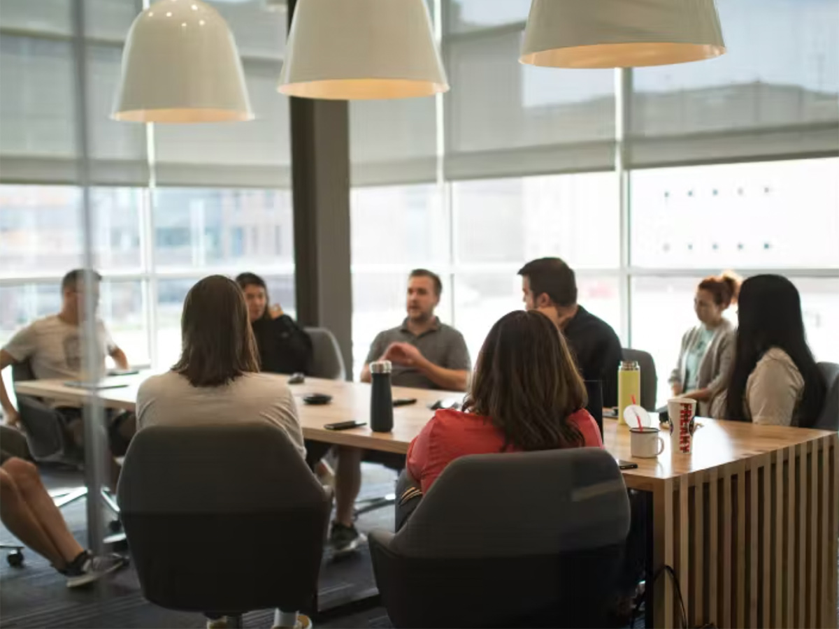 CompanyCam team members having a meeting