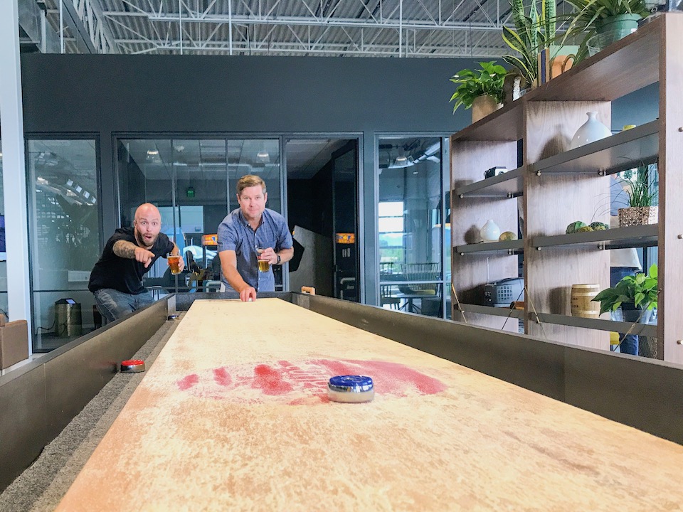 Conga staff playing shuffleboard