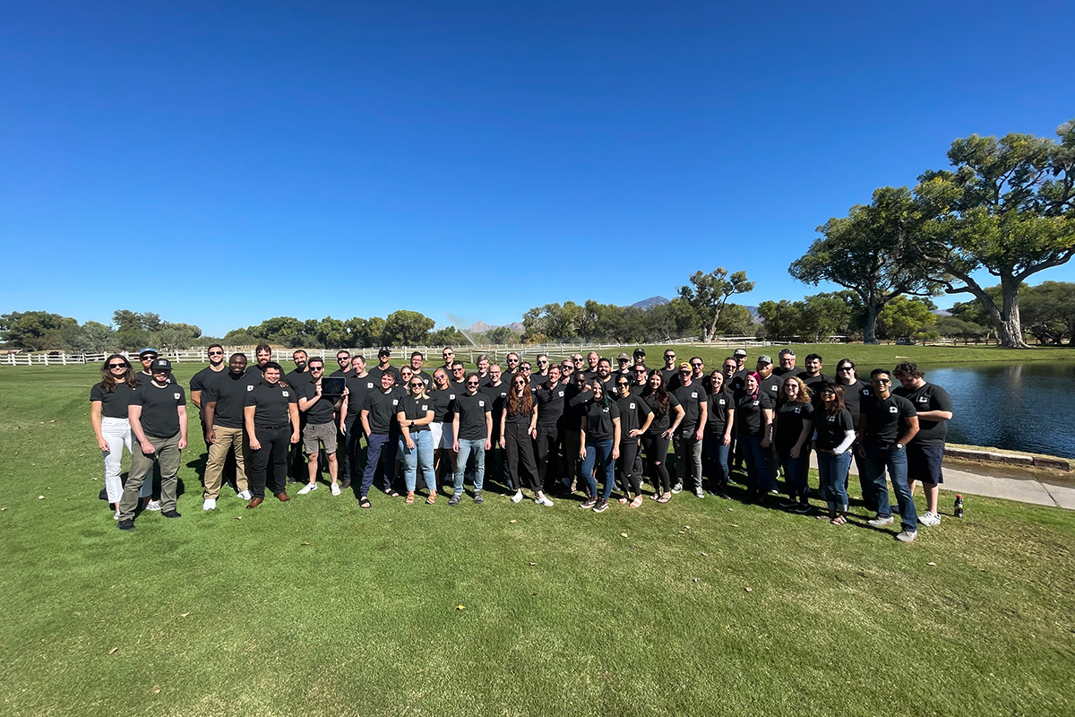 Faltfile group photo outside at a park