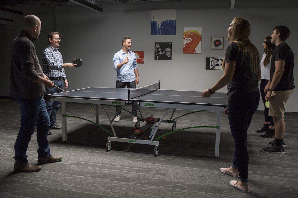 Formstack team playing pingpong 