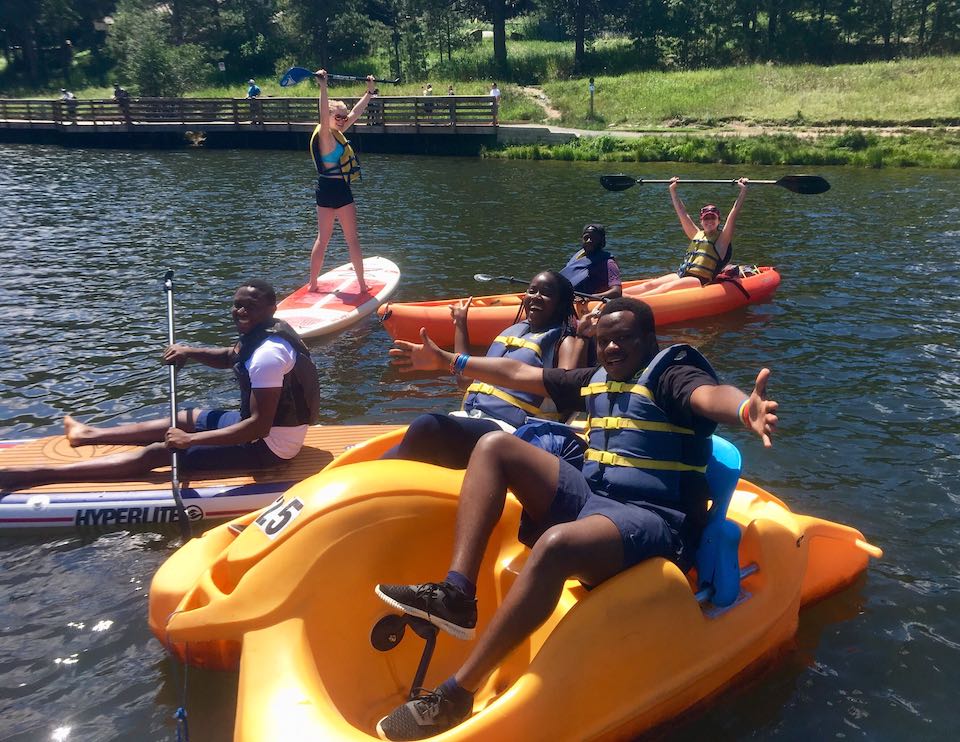 GigSmart team on kayaks and pattleboards