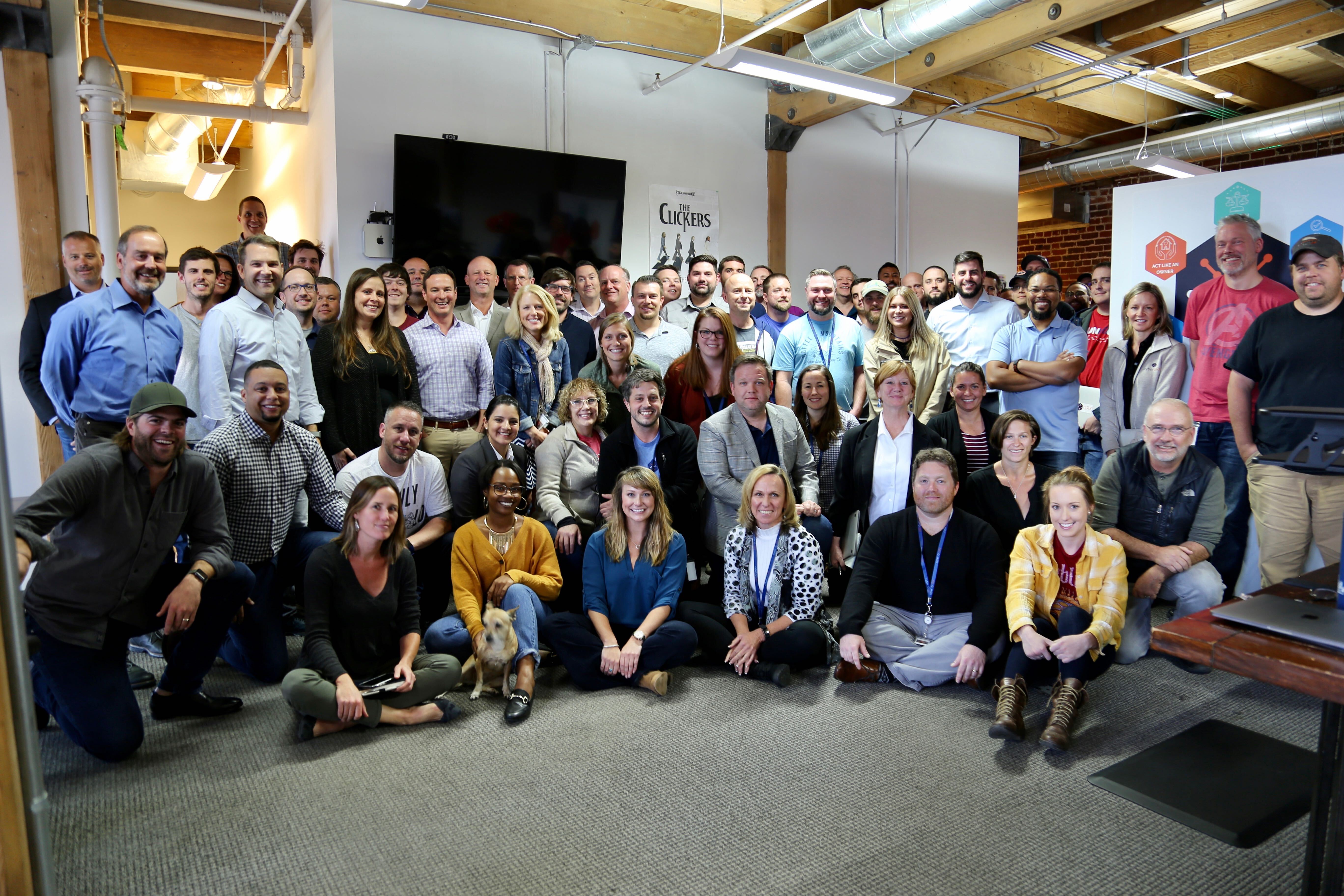 A group shot of CyberGRX employees in their office.