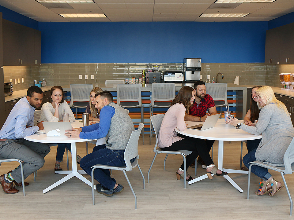 Zoom team collaborating in the office