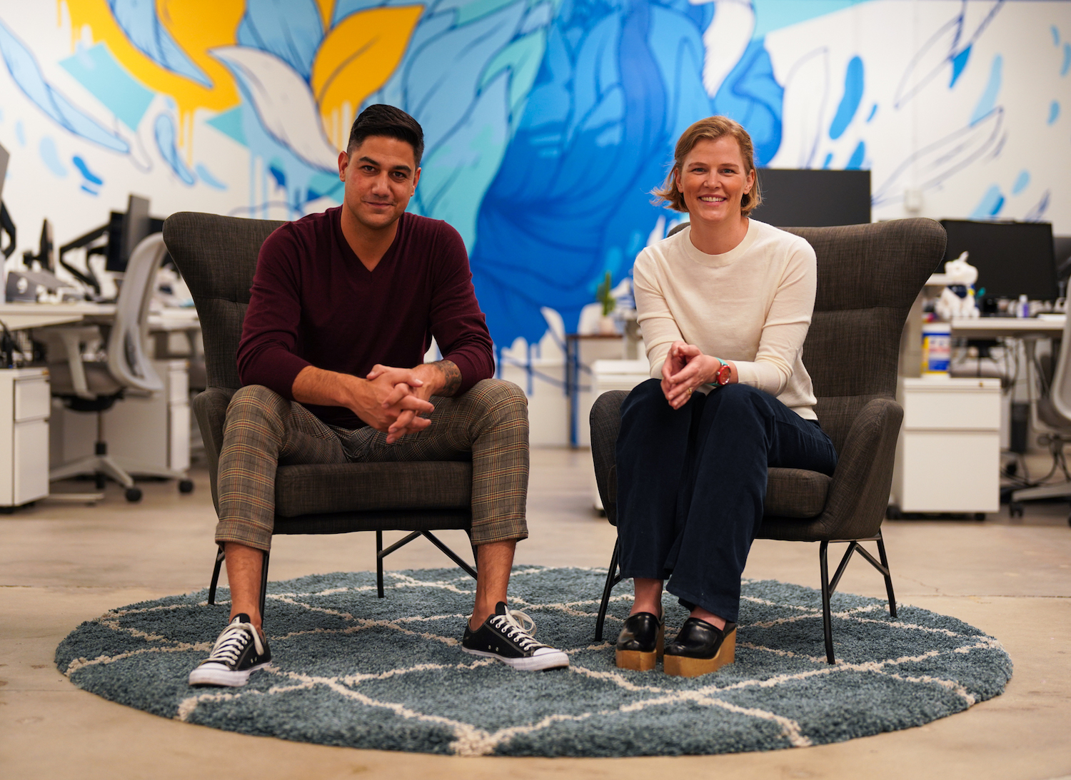 AgentSync CEO Niji Sabharwal and CTO Jenn Knight are pictured in AgentSync’s Denver office.