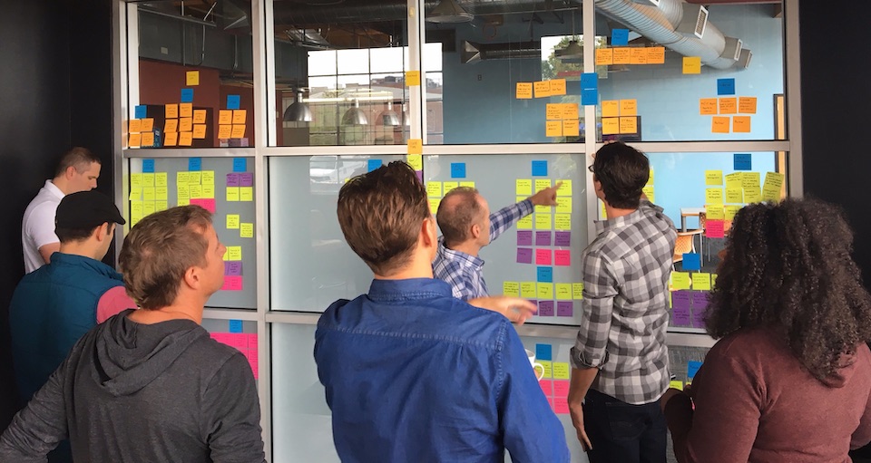 Mersive team members working at a whiteboard