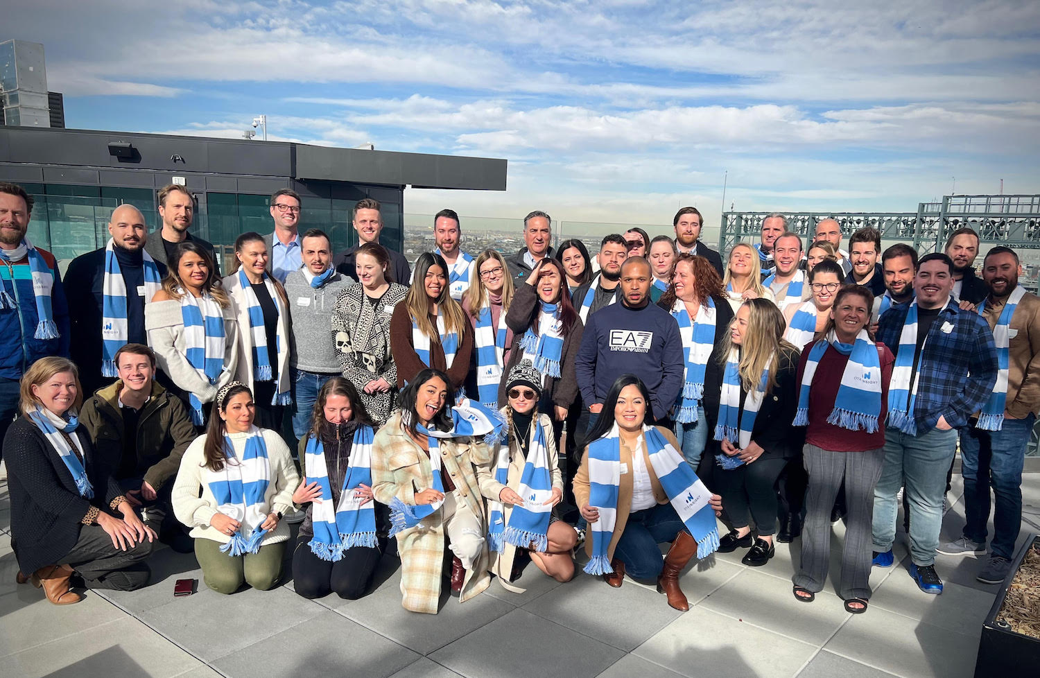 OTA Insight’s Denver employees pose for a team picture. | Photo: OTA Insight