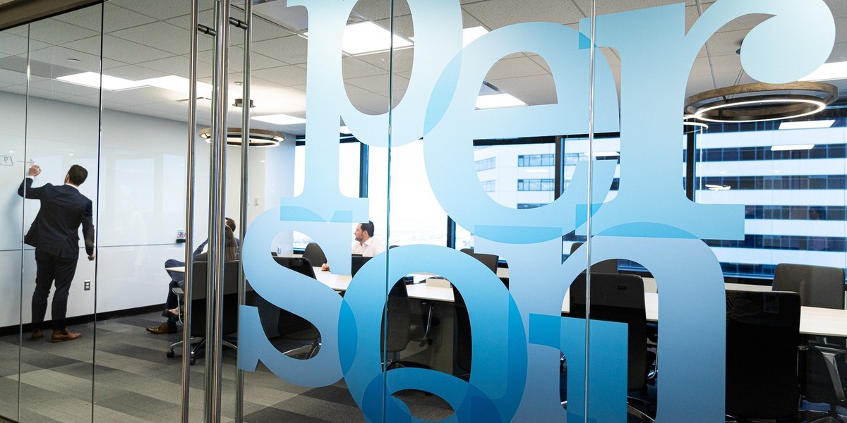 Glass doors in the Personal Capital office with the company logo on them