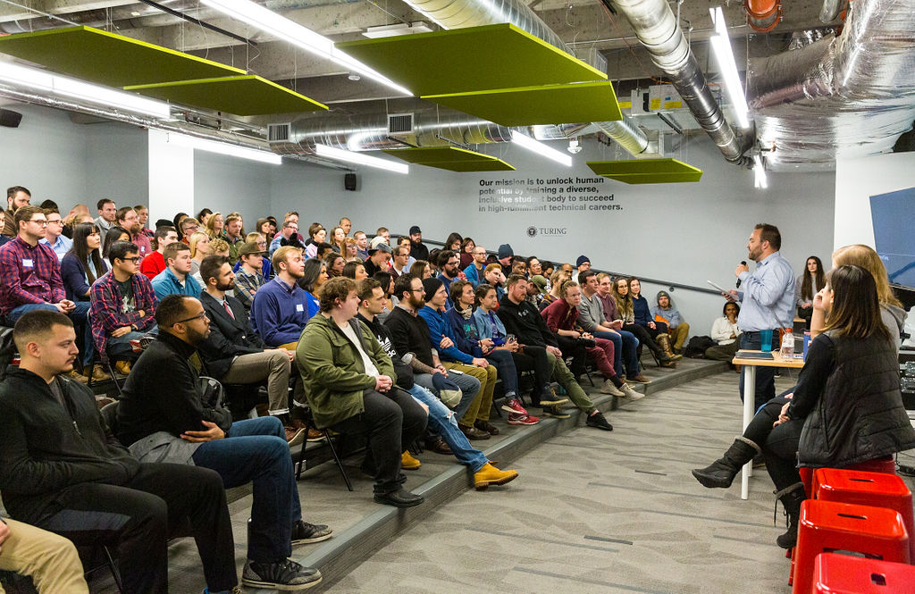 Turing School of Software & Design students and employees gather together