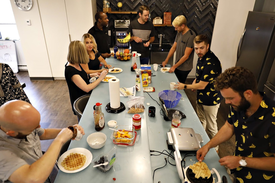 Adswerve team members making waffles