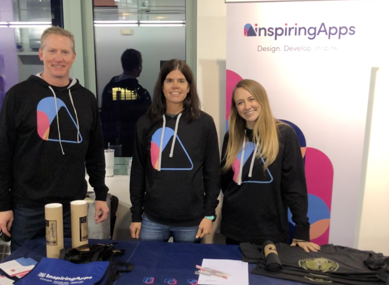 Three members of the InspiringApps team in an office environment