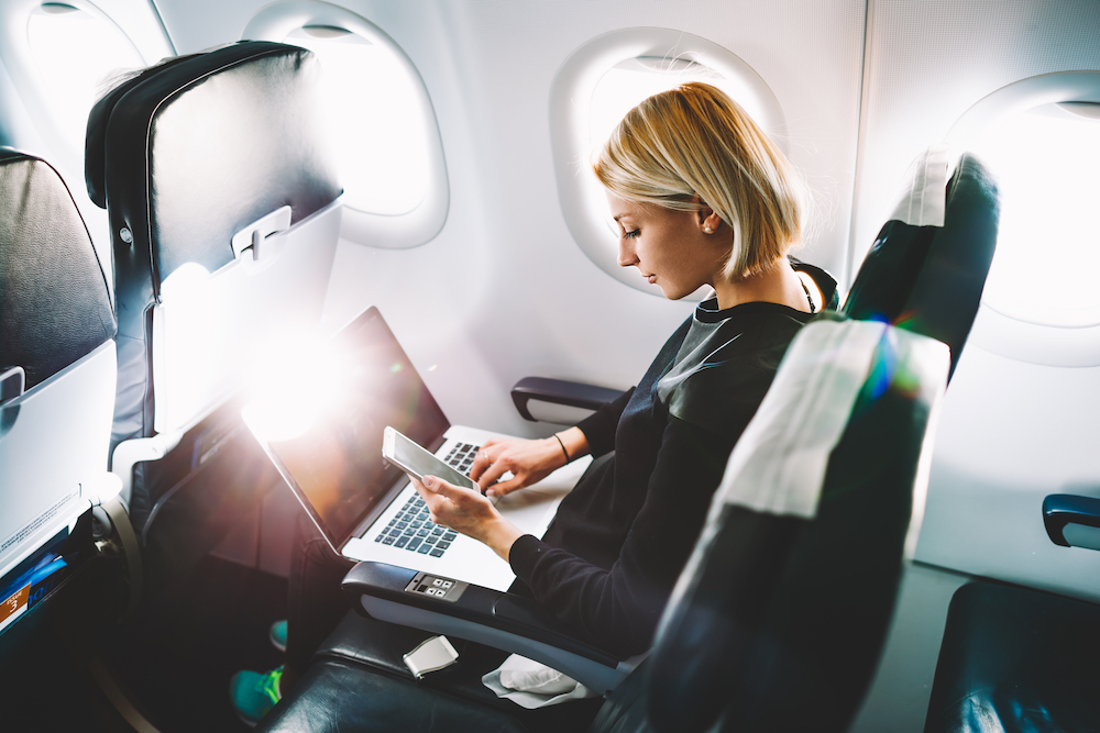 Businesswoman on Airplane
