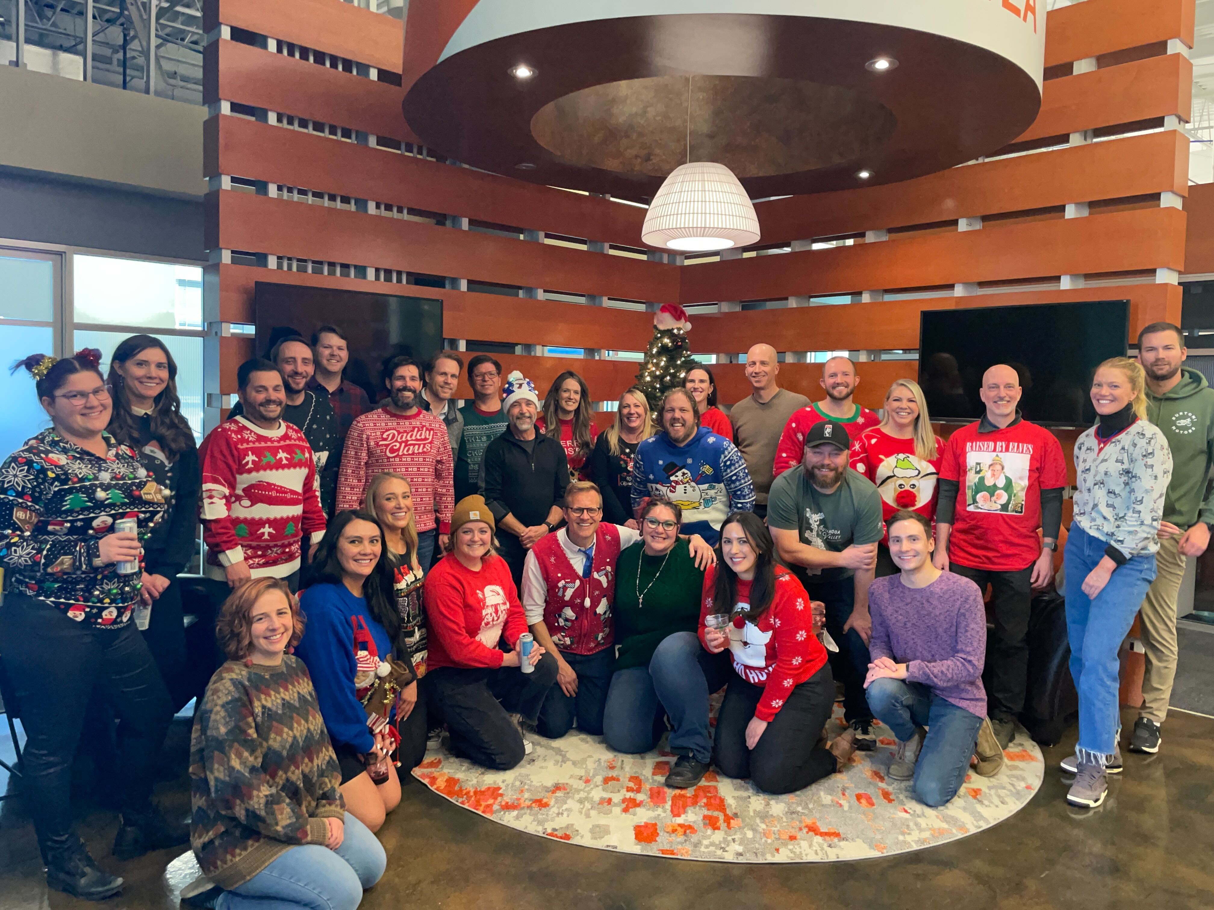 Wowza team members celebrate at a holiday party. 