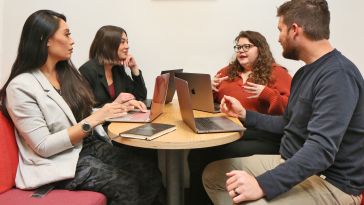 Matillion teammates discussing strategy in company office