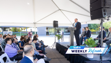 Gov. Jared Polis speaks at the opening of Atom Computing’s office in Boulder.