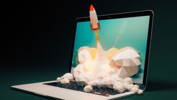 3D rendering of a rocket flying out of laptop screen