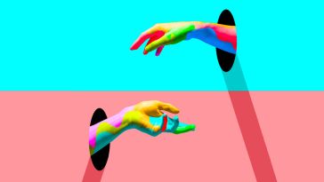 An image of two disembodied rainbow-colored hands reaching toward the center of the screen, looking like they are grasping for each other. One hand is emerging from a blue background, the other hand is emerging from a pink background. 