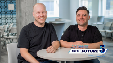 Elteve co-founders Ben Fuller (left) and Mike Weber (right) sit at a table inside.