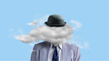 Concept photo of a man in suit and tie with a cloud for a head, hat on top