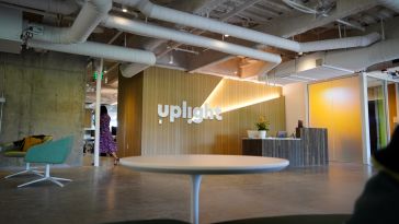 photo of uplight's office lobby with tables and chairs